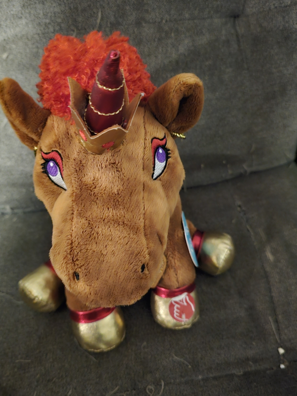 Plush Brown Unicorn Toy with Red Mane and Gold Hooves